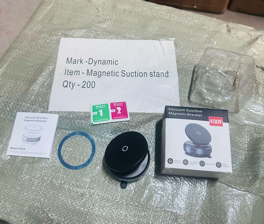 Magnetic suction stand kit for 360 degree phone holder featuring user manual and packaging