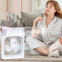 B3ejyj-8w portable fan with adjustable speeds providing cool comfort to a relaxed user indoors