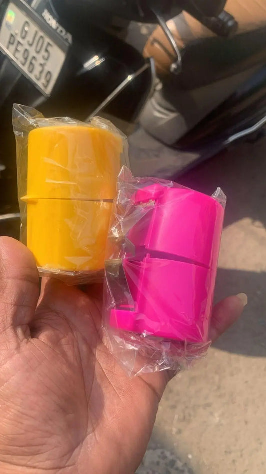 Best egg cutting tool in yellow and pink packaging held in hand for easy slicing