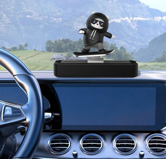 Fun car dashboard showpiece with a cute character skating on a stylish base