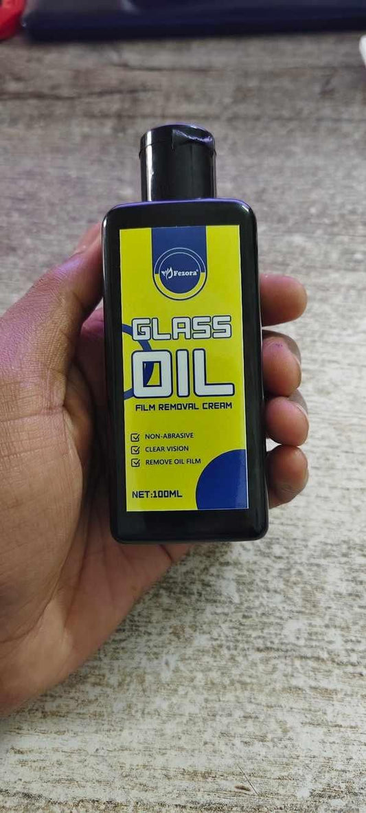 Car glass cleaning solution in a black bottle, effective for removing film and enhancing clarity