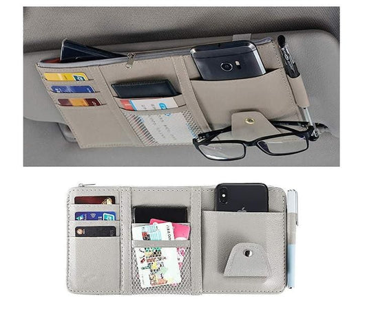 Car visor organizer in gray with pockets for cards, sunglasses, and a smartphone