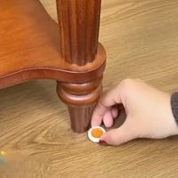 Applying cockroach killer gel near furniture to effectively eliminate pests