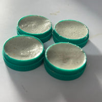 Four containers of cockroach killer gel for effective pest control in homes