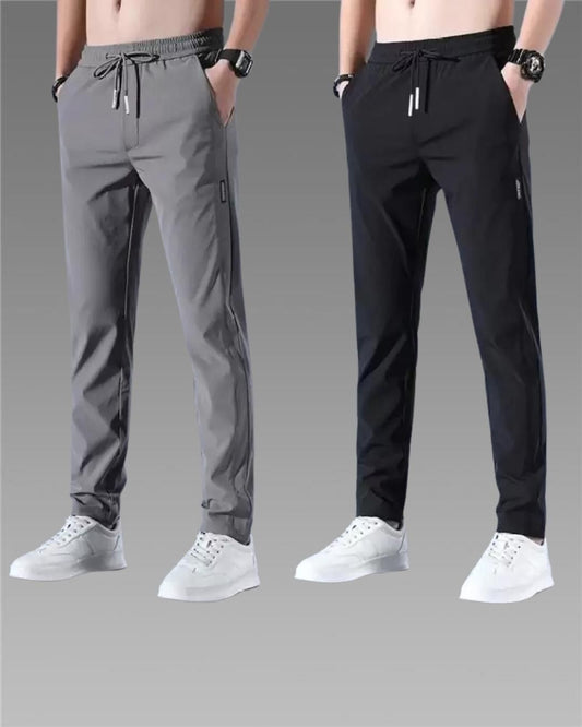 Comfortable athletic pants for men in gray and black with side pockets and elastic waistband