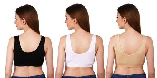 Set of three comfortable bras for women in black, white, and beige with wide straps for all-day wear