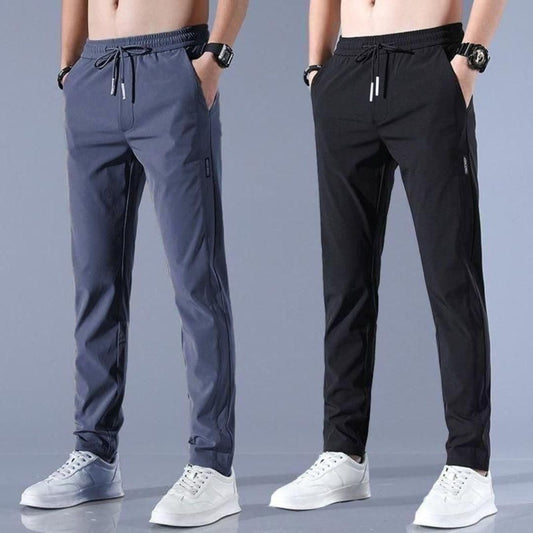 Comfortable men's track pants in gray and black, perfect for workouts and casual wear