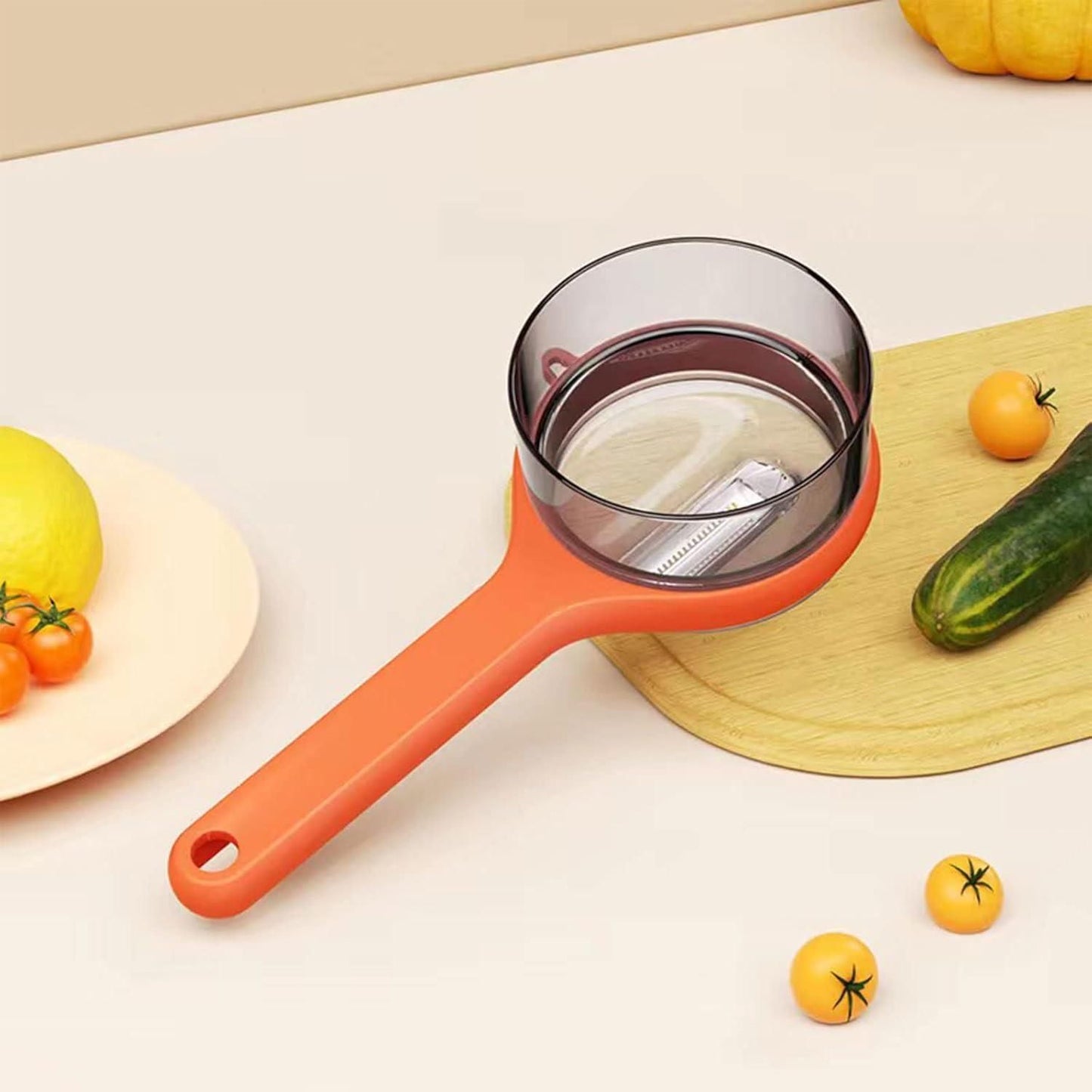 Multifunctional kitchen peeler with ergonomic handle and clear container for easy food preparation