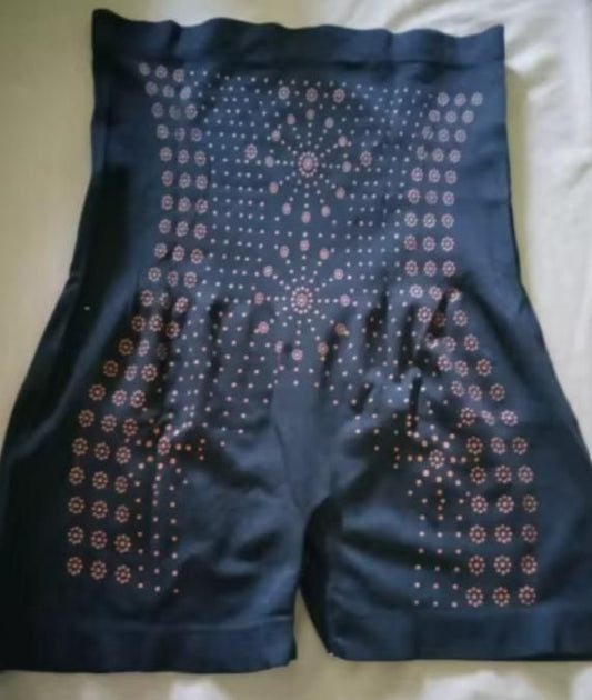 Women's high waist corset pants in black with decorative patterns for a stylish look